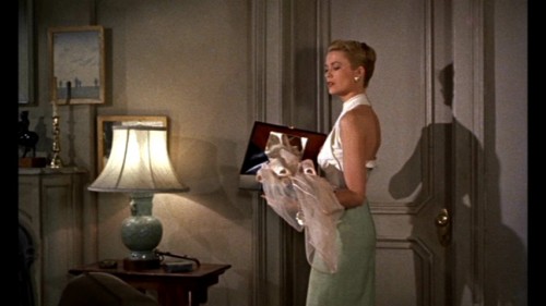 Grace Kelly with Mark Cross overnight bag in Rear Window