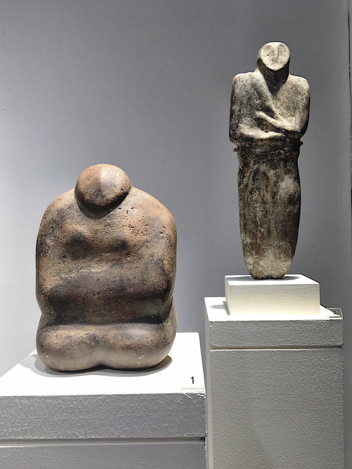 Male and female stone idols from milennial BC from CAHN, Basel at TEFAF New York Spring