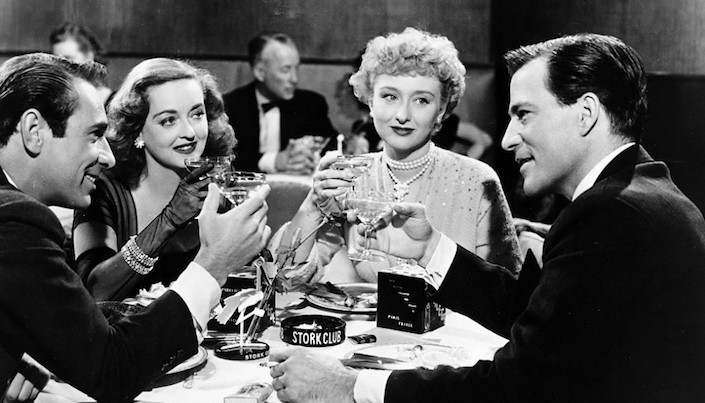 Betty Davis drinking champagne in All About Eve