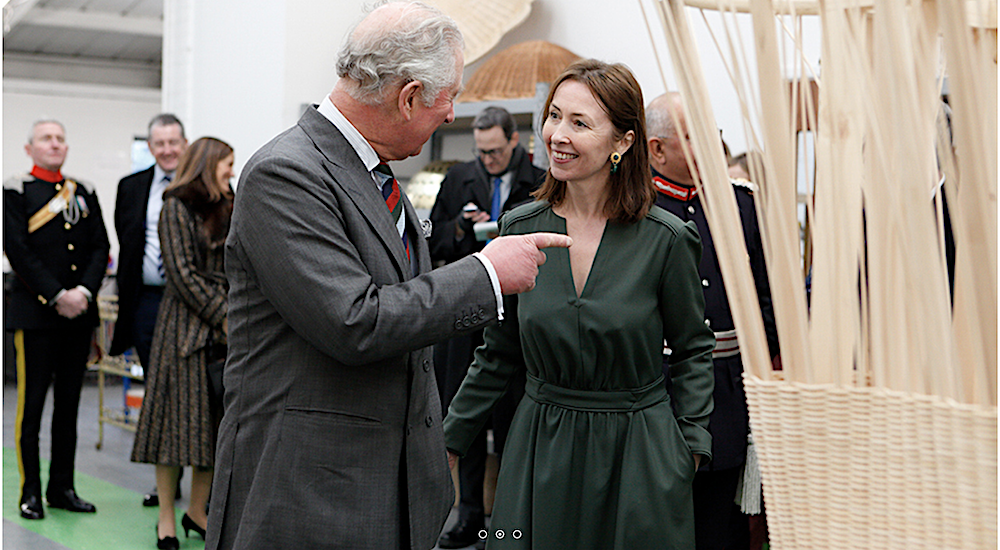 Lulu Lytle welcoming Prince Charles to Soane's Rattan workshop