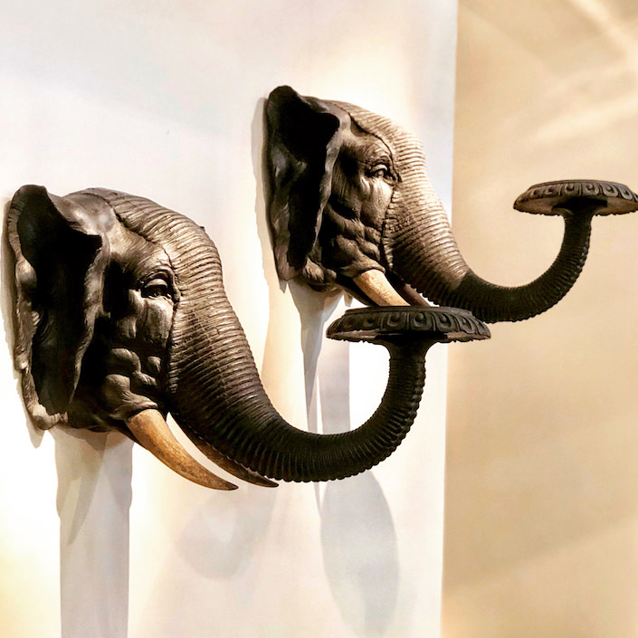 wooden elephant head brackets at Carlton Hobbs at the San Francisco antiques show