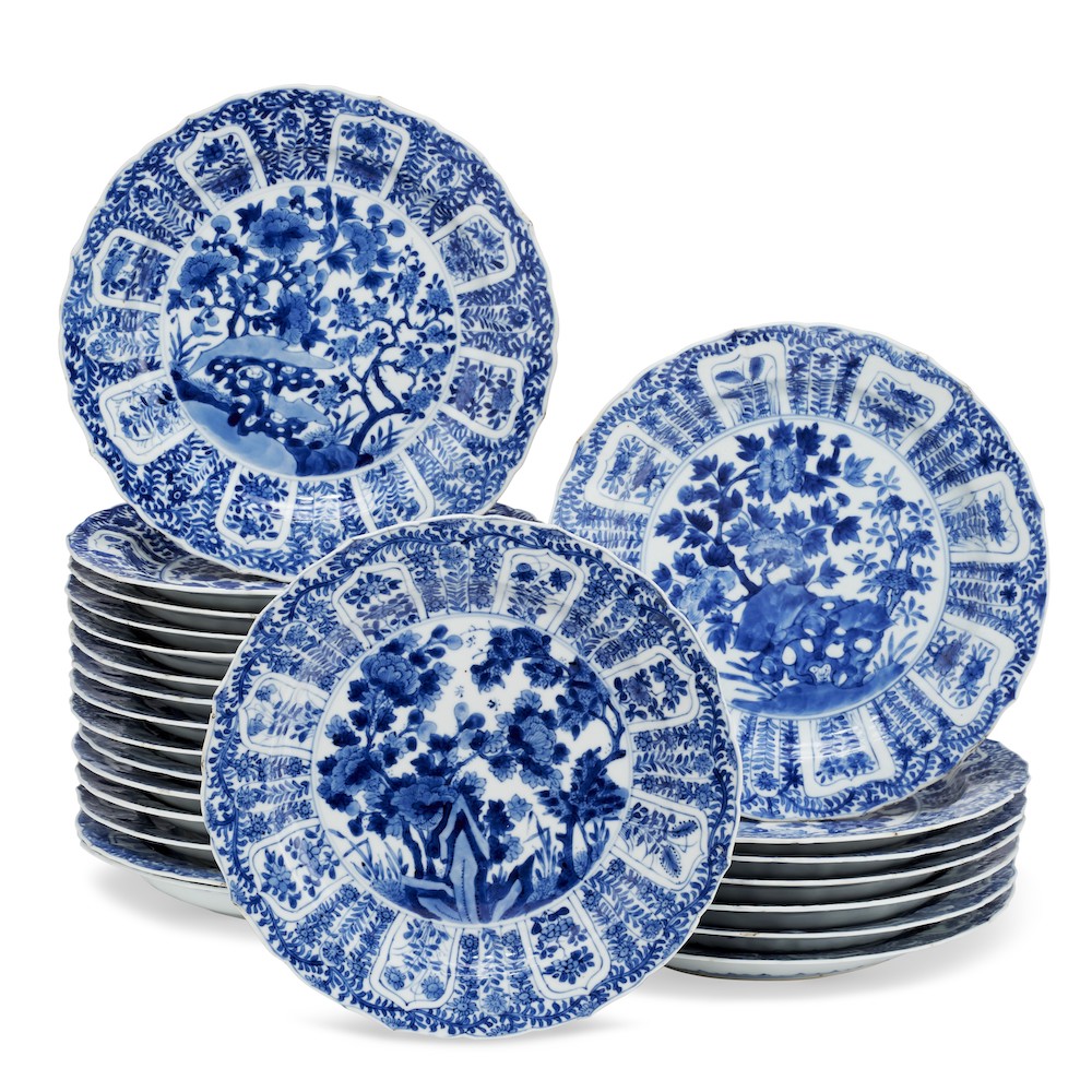 Christies auction Lot 135_A SET OF TWENTY-THREE CHINESE PORCELAIN BLUE AND WHITE MOLDED PLATES KANGXI PERIOD (1662-1722)