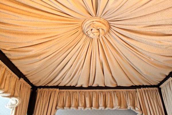 Inside of canopy bed at Mayflower Inn