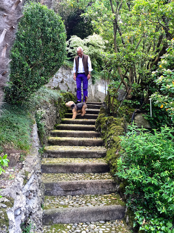 Romeo Sozzi with his dog at his villa